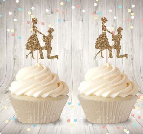 What could be more romantic than the groom to be on his knee proposing? These gold glitter cupcake toppers are really heartwarming and turn regular store bought cupcakes into showstoppers. See more party ideas and share yours at CatchMyParty.com #catchmyparty #partyideas #bridalshower #bridalshowerdecorations #cupcaketoppers Proposal Cupcakes, Bridal Shower Crafts, Mexican Wedding Cake Cookies, Bridal Shower Colors, Engagement Cupcakes, Mexican Wedding Cake, Biscuit Decoration, Rose Gold Bride, Bride To Be Balloons