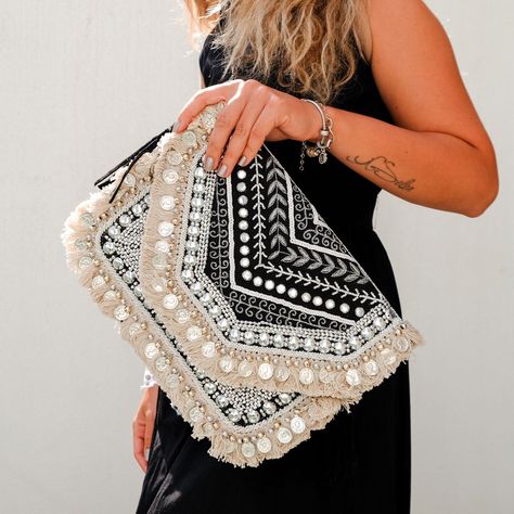 Our stunning black & white embroidered bohemian style clutcth ✨️ 🖤Can hold all or your essentials, even your favorite parfume! 🤍Whether you're hitting the beach or rocking your daily look, this clutch has got you covered! #HandcraftedBags Handcrafted Bags, Fancy Jewellery, March 27, Daily Look, Bohemian Style, Clutch Bag, The Beach, Black White, Black And White