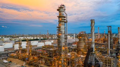 Oil refinery at twilight, aerial view pe... | Premium Photo #Freepik #photo #technology #light #construction #smoke Petrochemical Industry, Oil Rig Jobs, Oil Platform, Supply And Demand, Plant Background, Oil Refinery, Aerial Photograph, Oil Storage, Orange Sky