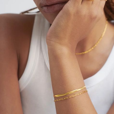 Discover timeless elegance with our Core Collection ✨ Elevate your style with these three must-have pieces: Snake Bracelet, Paperclip Bracelet and Ariel Necklace. #LoveLettersoxo #JewelryEssentials #TimelessElegance Bracelet Aesthetic Gold, Permanent Bracelet, Ariel Necklace, Jewelry Shoot, Bracelet Aesthetic, Wrist Stack, Gold Bracelets Stacked, Wrist Stacks, Jewelry Photography Styling