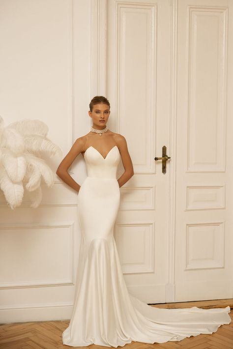 This elegant strapless gown is tailored in soft satin with amazing 3D organza flowers on the front. Chic mermaid skirt with a cathedral train creates a svelte silhouette for brides of all ages and body shapes. Accessorized with a weightless tulle overskirt, it takes on extra elegance for a grand down-the-aisle entrance Eva Lendel Wedding Dresses, Wedding Dresses 2023, Maternity Bridal Gowns, Eva Lendel, Wedding Dresses Mermaid Sweetheart, Satin Bridal Gowns, Bohemian Wedding Dress Lace, Bridal Gowns Mermaid, Ruffle Wedding Dress