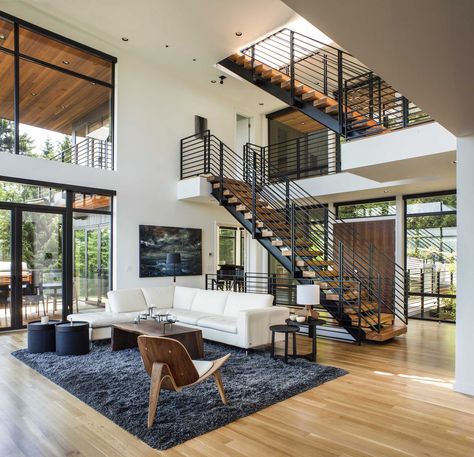 [Room] Double-height sitting area near the main stairwell in this home located in Portland, Oregon. [2000 × 1930] Open Plan Living Room, Level Homes, A Living Room, Open Plan Living, Casablanca, Modern Interior Design, Music Box, Interior Design Inspiration, 인테리어 디자인