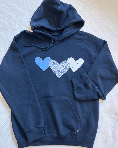 3 hearts sweatshirt 🩵💙🤍! Available in multiple colors and customizable! Check out the link in bio for more information! How To Sew Elbow Patches, Diy Sweatshirt For Boyfriend, Heart Hoodie Diy, Heart Stitch Hoodie, Stitch Sweatshirt Diy, Stitch Hoodie Diy, Hoodie Stitching Ideas, Homemade Sweatshirt Ideas, Designs To Put On Shirts