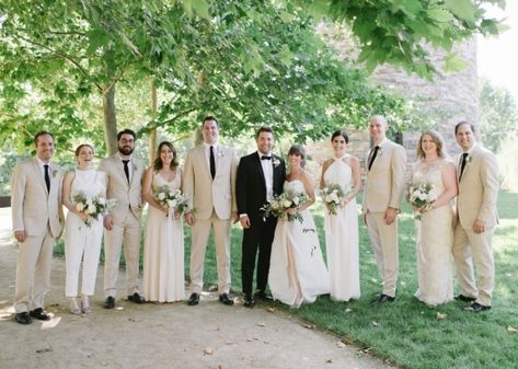 Light beige groomsmen suits with black ties at Kestrel Park Weddings & Events in Santa Ynez, California. Dream turned reality by Planner- Event Of The Season, Photographer- Norman & Blake and Florist- Intertwine. Groom In Beige Groomsmen In Black, Beige Suit Black Tie, Neutral Groomsmen Suits, Beige And Black Groomsmen Suits, Tan Suit Black Tie, Groomsmen Attire Khaki, Beige Groomsmen Suits, Beige Groomsmen, Khaki Groomsmen