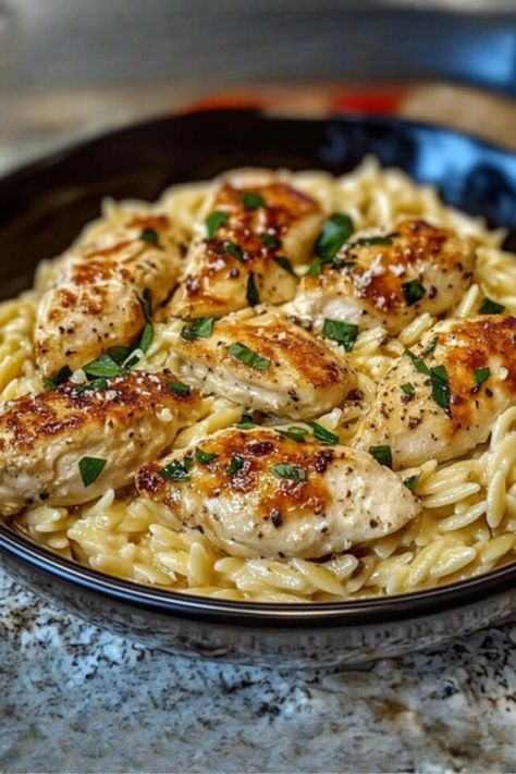 This delicious one-pan Creamy Parmesan Chicken and Orzo is the ultimate comfort meal. Tender chicken, creamy orzo, and rich Parmesan come together for an easy, satisfying dinner perfect for any night of the week. Whip up something special – get the recipe now #CreamyParmesanChicken #EasyDinnerRecipe #OnePanMeal #ChickenAndOrzo #ComfortFood #WeeknightDinner #QuickDinnerIdeas #FamilyDinner #ParmesanChicken #OrzoRecipe Orzo Recipes Healthy, Creamy Orzo Recipes, Cheesy Casserole Recipes, Chicken And Orzo, Parmesan Orzo, Creamy Parmesan Chicken, Orzo Dishes, Creamy Orzo, Orzo Recipes