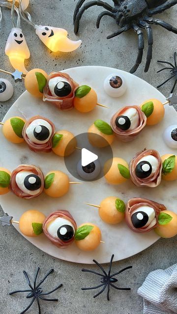 Sine Siemkowicz on Instagram: "Mozzarella Eyeball Skewers.👀

Deliciously spooky skewers for your Halloween gatherings with bocconcini, prosciutto, olives, and cantaloupe. Top with sea salt, olive oil and balsamic glaze. Yum!

#halloweenfood #halloweenideas #spookyszn #halloweenpartyfood #spookyfood #food52" Eyeball Salad, Mozzarella Eyeballs, Halloween 23, Spooky Food, Halloween Eyeballs, Manualidades Halloween, Fall Food, Balsamic Glaze, Halloween Food For Party