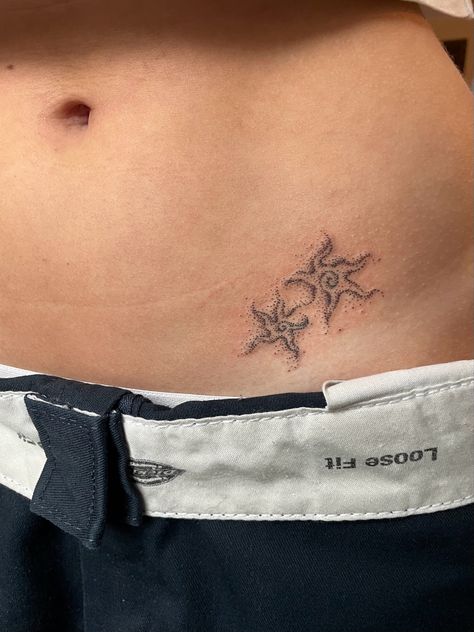 Women And Flowers Tattoo, Brittle Star Tattoo, Small Lower Belly Tattoos For Women, Cute Waist Tattoos, Botanical Tramp Stamp, Vine Ribcage Tattoo, Hip Tatoos Woman, Back Waist Tattoo For Women, Tattoo Over Shoulder