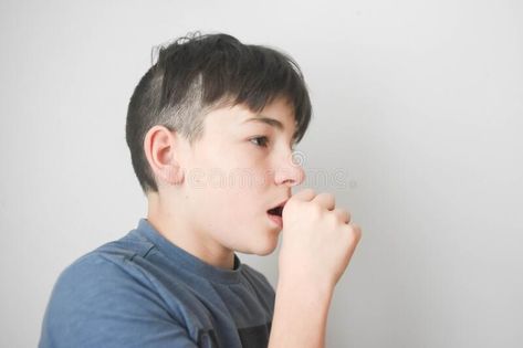 A Boy Coughing Into His Fist Stock Image - Image of mouth, virus: 206513281 Person Coughing Reference, Sick Boy, Photo Image, Stock Images, Stock Photos, Photographer