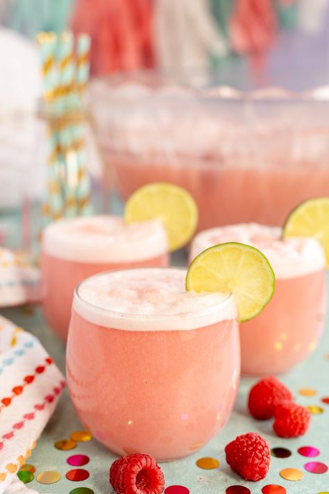 The best pink punch for baby showers, bridal showers, princess parties, and more! Easy Pink Punch, Baby Shower Punch For Girl, Pink Baby Shower Punch, Pink Punch Recipe, Football Game Snacks, Pink Punch Recipes, Shower Punch, Easy Drinks To Make, Raspberry Drink