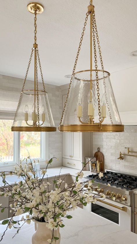 Answering your most asked kitchen source questions! Comment SHOP to receive links to all of the exact products I used in this space, or… | Instagram Rejuvenation Hood Classic Pendant, Pendant Lighting Over Kitchen Peninsula, Transitional Style Lighting, European Lighting Fixtures, Sw Utterly Beige, Two Story Entryway Lighting, Sw Realist Beige, Kitchen Light Fixtures Over Island, Sw High Reflective White