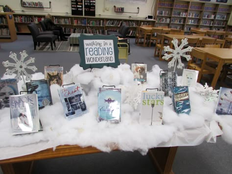 Walking in a reading wonderland. Our winter book display. January Book Displays Library, Winter Book Displays Public Libraries, Winter Library Book Displays, January Book Display, Winter Book Fair Theme, Winter Wonderland Book Fair, Winter Book Display, Winter Wonderland Library, Winter Library Displays