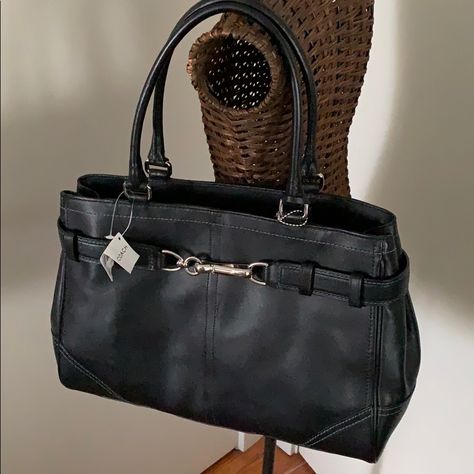 Black Leather Coach Bag, New With Tags. Footed Bottom. Silvertone Buckle Hardware On Front Of Bag. Zipper Top To Close. Inside, One Zippered Pocket And Two Slip Pockets. Black Fabric Lining. Very Roomy Interior. Tassel Detail. 13.5” Wide, 10” High, 5.5” Wide, 8.5” Handle Drop. Work Bags For Women, Coach Leather Bag, Dream Bags, Bag Decoration, Leather Coach, Pretty Bags, City Bag, Black Shoulder Bag, Work Bag