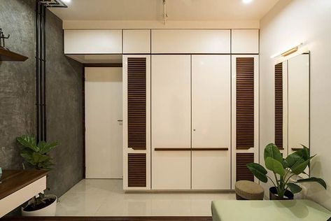 Storage Above Door, Girly Apartment Ideas, Overhead Cabinet, Guys Room Aesthetic, Wooden Ottoman, Room Ideas For Men Bedroom, Louvered Doors, Home Decor Ideas Kitchen, Wooden Wardrobe Design