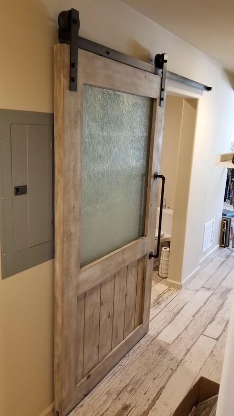 Sliding Barn Door With Window, Barn Door With Glass Panels, Barn Door With Glass, Glass Barn Doors Interior, Brick Bathroom, Barnwood Doors, Barn Door Window, Log Home Kitchens, Double Sliding Barn Doors