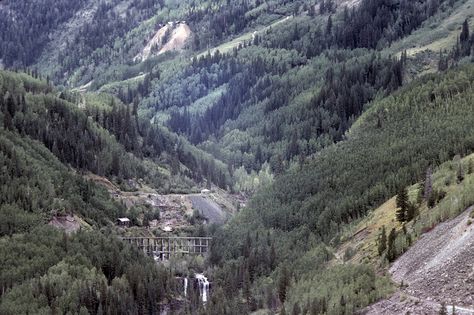 Aerial view of the Howard Fork Valley, houses and abandoned mines and the  old Rio Grande Southern railroad trestle in Ophir (San Miguel County),  Colorado. Colorado Railroad, Trout Lake, Ghost Town, Ghost Towns, Rio Grande, Aerial View, The Old, Colorado, Ghost