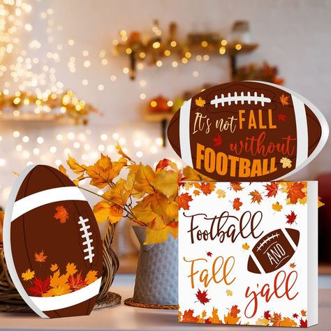 PRICES MAY VARY. What Will You Get: you will receive 3 pieces of football fall decors in different styles, which are in lined with themed parties throughout the fall, using them as decorations will create a joy and intense festival atmosphere Football and Autumn Themed Design: the football home decor is printed with maple leaves, football, and the letters of [football and fall y'all], [it's not fall without football], which are brightly colored, lively and charming, heralding the arrival of Than Fall Football Decor, Classic Centerpieces, Fall Indoor Decor, Shelf Classic, Fall Decorations Indoor, Camping Week, Fall And Football, Autumn Aura, Football Party Ideas