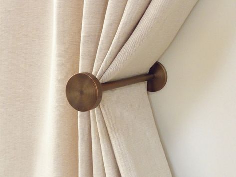 It’s all in the details. Shop our curtain holdbacks today. Image via @pinterest ⁣ Curtains Pictures, Curtain Holdbacks, Curtain Holder, Curtain Shop, Curtains Holdbacks, Curtain Ties, Interior Modern, Curtain Poles, Brushed Bronze