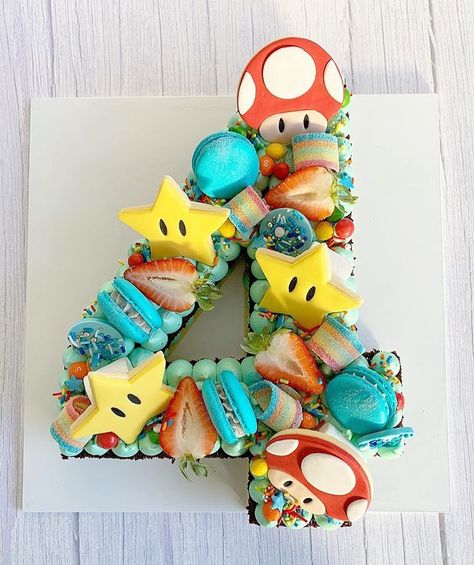 The Most Heavenly Cakes 💛🍭🍩 (@euphoric_cakes) posted on Instagram: “⭐️ Cookie cake by @wishingwhisk ⭐️ The Mario lover in me is going so crazy over this!!! 🍄🍄🍄 Currently working my way through some old games…” • Oct 2, 2020 at 7:20pm UTC Half Cake, Number Birthday Cakes, Super Mario Cake, Birthday Sweets, Mario Cake, Super Mario Birthday Party, Boy Birthday Party Themes, Mario Birthday Party, Super Mario Birthday