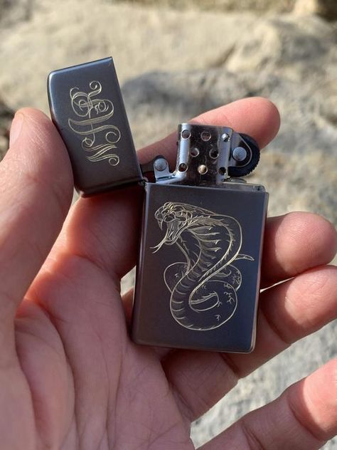 Hand engraved Zippo Lighter Custom Image Cobra Initial Monogram Name Personalized VIDEO. #axes #handmade Zippo Lighter Custom, Engraved Zippo, Custom Lighters, Environmentally Friendly Gifts, Cool Lighters, Pretty Knives, Lighter Fluid, Image Swag, Initial Monogram