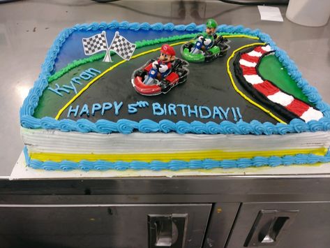 Marble slab cake with vanilla whipped icing, air brushing, bavarian creme and mario kart deco pac Mario Sheet Cake, Super Mario Race Track Cake, Mario Buttercream Birthday Cake, Mario Kart Sheet Cake, Mario Kart Birthday Cake, Super Mario Birthday Cake Buttercream, Mario Kart Birthday, Slab Cake, Whipped Icing