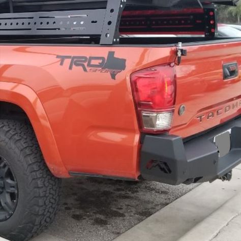 Fab Fours Tacoma rear replacement bumper integrates the existing receiver hitch. In addition to added style & formed-steel durability, the vehicle gains two recovery points. The ultimate in functionally-stylish rear-end protection.

Integrated Steps on each side of bumper
D-Ring Recovery points
Fits around OEM receiver hitch a & trailer wiring locations
Black powder-coat finish
Made in the USA
Fab Fours Premium front bumpers are backed by a limited lifetime structural warranty , 1year finish. Tacoma Rear Bumper, Trailer Wiring, Tacoma Trd, Receiver Hitch, Toyota Tacoma, D Ring, Trailer, Toyota, Trucks