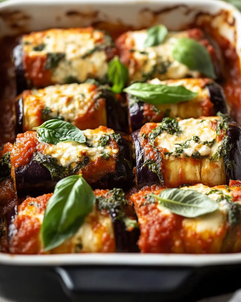 Tender baked eggplant slices rolled with creamy ricotta and spinach, topped with rich tomato sauce and melty mozzarella. A delicious, comforting vegetarian dish perfect for any occasion! Eggplant Lasagna Roll Ups, Ricotta Vegetable Recipes, Eggplant Francaise, Vegetable Roulade, Italian Vegetable Recipes, Eggplant Roll Ups, Recipes With Ricotta, Eggplant Bites, Baked Eggplant Slices