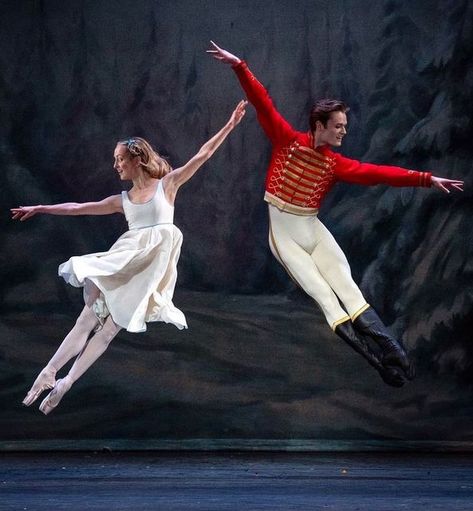 Pam Norris on Instagram: "The depth of talent at the ROH is just awesome. Here are Sophie Elizabeth Allnatt as Clara, and Liam Boswell as Hans Peter, the nephew of Drosselmeyer, from The Nutcracker. What a wonderful photo this is …..complete control & artistry of movement.♥️Thank you to Andrej Upenski for your brilliance! 2022. #nutcracker #peterwright #clara #nephew #redjacket #uniform #whitedress #thiswaythatway #insync #royalballet #dancers #ballet #classicalballet #festive #jump #wednesdayw Clara In The Nutcracker, Ballet Couples, Nutcracker Wedding, Clara And The Nutcracker, Nutcracker Aesthetic, Clara Nutcracker, Nutcracker Clara, Nutcracker Season, Nutcracker Tree