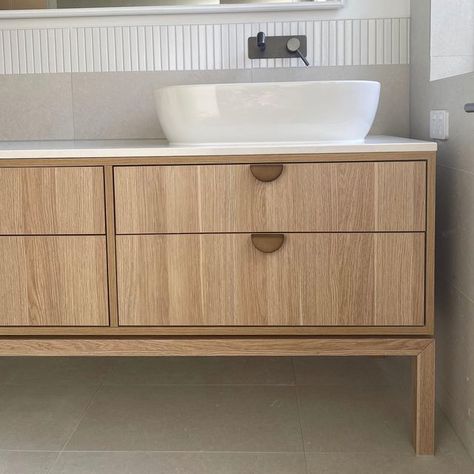 GC SJ on Instagram: "Custom vanity constructed from @polytec Natural oak ravine, finished off with @loandcointeriors Luna pull handles 😍 Designer @studiojdesignco #gawlercustom #gawler #custom #joinery #specialist #cabinets #cabinetry #cabinetmaker #barossavalley #Barossa #sabuilt #design #bathroom #vanity #shadowline #stone #ambassador #whitetruffle #polytec #naturaloak #ravine #loandco #lunapull" Bespoke Bathroom Vanity, Flat Front Bathroom Cabinets, Polytec Natural Oak, Bathroom Vanity With Legs, Polytec Natural Oak Ravine, Bathroom Vanity Cupboards, Vanity Handles, Rift Sawn White Oak Bathroom Vanity, Bathroom Vanity Oak