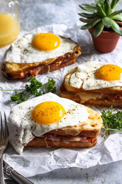 This sandwich is the perfect simple and impressive brunch recipe. The Croque Madame takes a normal ham and cheese sandwich up a notch by including bechamel sauce and an over easy egg to top it all off. #croquemadame #croquemadamesandwich #FrenchSandwich Quick Brunch Recipes, European Breakfast, Quick Brunch, French Sandwich, Easy Sandwich Recipes, Over Easy Eggs, Croque Madame, Brunch Recipe, French Recipes