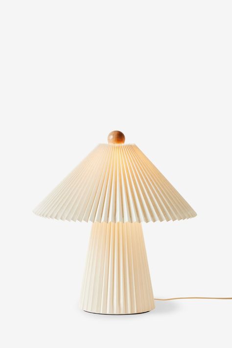 Scandi, minimal, on-trend - need we say more? In an all-over fluted design, Lila casts a soft glow and makes a statement out of being subtle. Product dimensions; Height; 52cm Width; 47.5cm Depth; 47.5cm. Weight; 1.8Kg. Product Details; Assembly Required; yes. Bulbs required; 1 /E14 Candle / 7W LED. Bulb Included; no. Cable Length; 180cm. Cable colour; white. Switch and plug colour; white. Dimmable; no. Care instructions; Wipe clean with a soft dry cloth only. Ensure the light is unplugged or swi Scandi Living Room Lamp, Ceiling Bedroom Lights, Bedroom Mood Lighting, White Bedside Lamp, Designer Table Lamps, Dimmable Table Lamp, Bedroom Light, Trending Products, Big Girl Rooms