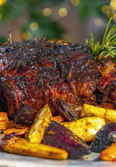 Slow-Roasted Lamb with Rosemary, Garlic & Red Wine & Rosemary Roasted Roots - Ainsley Harriott Slow Roast Lamb Leg, Lamb Leg Roast Recipes, Ainsley Harriot, Lamb Slow Cooker Recipes, Food Slow Cooker, Lamb Roast Recipe, Red Wine Recipe, Red Wine Reduction, Slow Roast Lamb