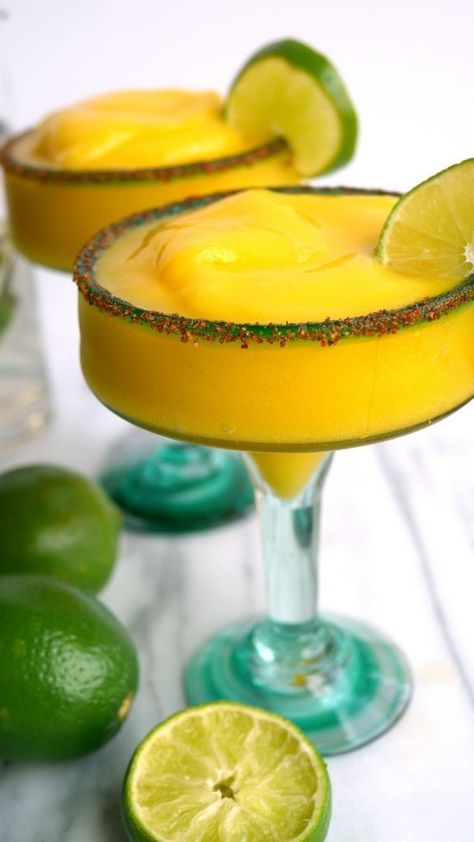 Spicy Mango Frozen Margaritas are deliciously delicious Mango Jalapeno Margarita, Tiki Drinks Recipes, Mango Margaritas, Mango Margarita Recipe, Frozen Mango Margarita, Spicy Margarita Recipe, Strawberry Sangria, Mango Cocktail, Tiki Drink