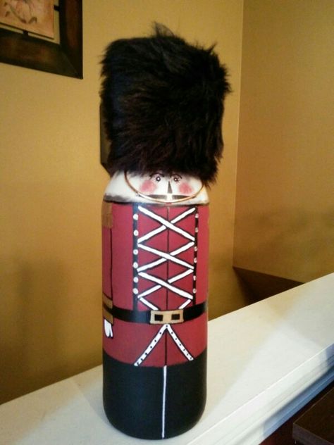 TOY SOLDIER WINE BOTTLE Nutcracker Wine Bottle Diy, Santa Wine Bottle Crafts Diy, Wine Bottle Santa, Painted Christmas Toy Soldier, Holiday Wine Bottle Crafts Wine Wicks & Gifts, Holiday Wine Bottles, Wine Bottle Crafts Christmas, Hand Painted Bottles, Wine Glass Art