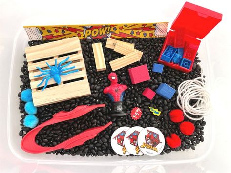 One-of-a-kind Spiderman-themed sensory bin created by me, a pediatric occupational therapist with your child's developmental skills in mind.  Everything your little one needs to engage in valuable imaginative and sensory play for hours on end.  FREE SHIPPING! Spiderman Gifts, Sensory Crafts, Colored Rice, Sensory Boxes, Sensory Bottles, Sensory Bin, Toddler Play, Occupational Therapist, Activity Kits