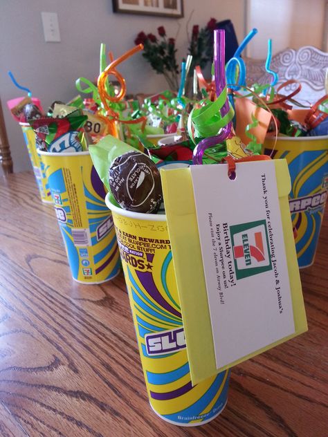 My boys turned 7 and 11 years old and their birthdays are very close together. For their combined birthday party favor I made these for the guests. "Thank you for celebrating our 7 eleven birthday today" Enjoy a slurpee on us! $2 in the envelope behind the card. It's better than all the plastic junk they usually get.  Filled the slurpee cups with some candy, silly straw and tissue paper. 7 11 Party, Birthday Party Favor Ideas, Boys Birthday Party Favors, 11 Birthday, Eleventh Birthday, Party Favor Ideas, Boy Party Favors, Boy Birthday Party Themes, Plantas Vs Zombies