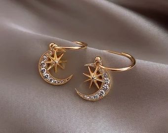 Stars and moon earrings | Etsy Sikat Gigi, Moon And Star Earrings, Korean Jewelry, Crescent Moon Earrings, Moon Star, Gold Rhinestone, Crystal Drop Earrings, Moon Earrings, Gold Drop Earrings