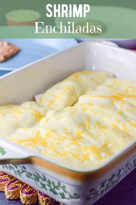 These shrimp enchiladas are a perfect addition to your Cinco de Mayo celebration. Succulent shrimp nestled with veggies in a flour tortilla and smothered with sour cream sauce! #shrimp #seafood #shrimpenchiladas #enchiladas #cincodemayo #dishesdelishrecipes https://ddel.co/shmpench Shrimp And Spinach Enchiladas, Easy Shrimp Enchiladas Recipes, Easy Creamy Shrimp Enchiladas, Easy Shrimp Enchiladas, Seafood Burrito With White Sauce, Shrimp Enchiladas Recipes Easy, Shrimp Enchiladas With Green Sauce, Seafood Enchiladas With White Sauce, Shrimp Enchiladas With White Sauce