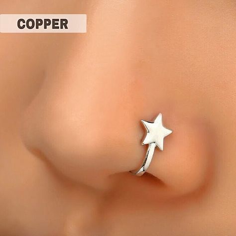 Fake Nose Piercing Nose Cuff Copper Silver Tone 5-Pointed Star Charm Size L 7/16” X W 1/4” X D 5/16” Fading / Tarnish Resistant Durable Single | Asymmetric Wearing No Piercing Required Lightweight 1 Pc / Lot Condition Nwt Mix & Match 3 Listings For $18 Queendomjewelry Btq 8k+ Sold Items 600+ Available Listings 4.9 Rating Fashion Costume Fake Faux Simulated Vegan Brand Basic Casual Metal Metallic Clip On Wrap Smooth Shiny Glossy Glistening Chic Gift Elegant Rhodium Platinum Feminine Stylish Class Star Nose Ring Hoop, Fake Piercings Nose, Nose Piercing Women, Star Nose Piercing, Fake Nose Cuff, Fake Nose Piercing, Star Simple, Fake Nose Ring, Nose Cuff