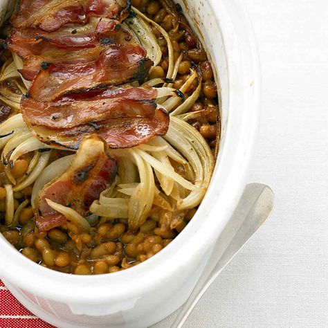 Molasses provides a touch of sweetness these rich beans. Martha Stewart Baked Beans, Molasses Baked Beans, Baked Beans With Bacon, Beans With Bacon, Baked Beans Recipe, Boston Baked Beans, Martha Stewart Recipes, Baked Bean Recipes, Salt Pork