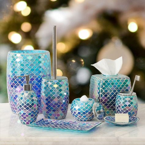 Add a touch of class to your bathroom with this unique mermaid-themed bathroom accessory set that includes a lotion dispenser, toothbrush holder, cotton jar, vanity tray, and soap dish. The bright-colored mosaic glass design is eye-catching and practical, transforming your ordinary bathroom into a modern and stylish one. #mermaid #bathroom_accessory_set Soap Dispenser Tray, Mermaid Bathroom Decor, Glass Bathroom Accessories, Mermaid Bathroom, Bathroom Accessories Set, Mosaic Bathroom, Bathroom Decor Sets, Blue Mosaic, Handmade Mosaic