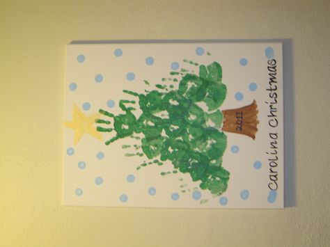 Used both boys' hands; put ages, date and address on back of canvas. To commemorate our first North Carolina Christmas in 2011. Christmas Canvas Art For Preschoolers, Canvas Christmas Presents From Kids, Diy Christmas Canvas Art Kids, Preschool Christmas Canvas Art, Diy Christmas Paintings On Canvas Kid Hand Prints, Christmas Canvas Art Easy Kids, Preschool Christmas Canvas, Christmas Canvas Crafts For Kids, Christmas Canvas Paintings For Kids