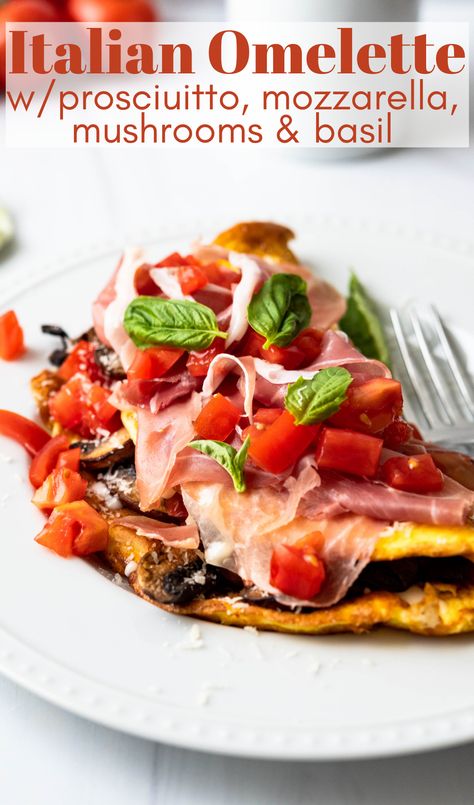 Italian omelette on a plate with basil garnish. Omlet Recipes Italian, Special Omelette, Italian Omelette Recipe, Prosciutto Omelette, Tomato And Cheese Omelette, Caprese Omelette, Italian Omelette, Healthy Omelette, Ham And Cheese Omelette