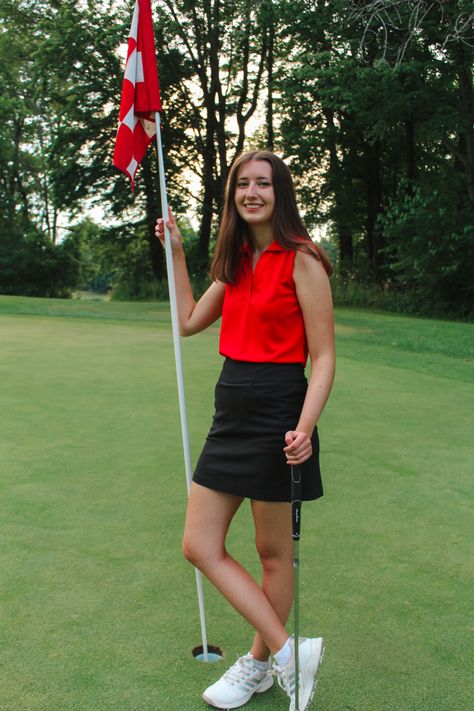 Paige Rocker Photography || senior golfer, class of 2024 senior photos, senior photo inspo, high school senior photography, high school golf, golfer senior pictures, golf photo ideas, golf portraits, sports senior photos, golfer in red tank and black skirt posing for photo by hole flag Golf Poses Photo Ideas, Golf Portraits, Golf Poses, Golf Senior Pictures, High School Golf, Cool Senior Pictures, Golf Photos, Cute Senior Pictures, Golf Pictures