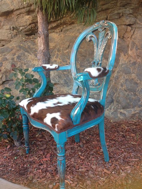 ****SOLD**** Meet "Winston Chairchill". Winston started his life as an ivory toned antique chair with all the right components ... stability, history, world class charm and elegance. He longed to be the center of attention and knew he'd have to make some changes. He's a creative fellow and decided that all ladies love turquoise and no one can deny the sheer elegance of sumptuous cowhide. Winston is available for adoption for $595. Commode Shabby Chic, Cocina Shabby Chic, Cowhide Chair, Cowhide Furniture, Painting Wooden Furniture, Victorian Chair, Shabby Chic Dresser, Western Furniture, Old Chair