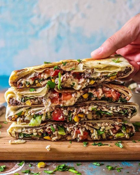 Vegan Crunch Wrap Supreme! It's irresistibly yummy and full of flavor, especially with our Homemade Hispanic black beans  Follow us @cocohealthyrecipes for Daily vegan recipes  𝐈𝐧𝐠𝐫𝐞𝐝𝐢𝐞𝐧𝐭𝐬 ⁣⁣ ⁣⁣ - 2 tbs of olive oil ⁣⁣ - 2 cups of mushrooms, diced ⁣⁣ - 1 tsp of garlic powder ⁣⁣ - 1 tsp of tajin * ⁣⁣ - 1/2 cup of corn ⁣⁣ - 1/2 cup of cooked rice ⁣⁣ - Salt/pepper to taste ⁣⁣ ⁣⁣ 𝐈𝐧𝐬𝐭𝐫𝐮𝐜𝐭𝐢𝐨𝐧𝐬⁣⁣ ⁣⁣ 1. Cook olive oil, mushrooms, garlic powder and tajin for 5 minutes. ⁣⁣ 2. Add c Vegan Crunch Wrap Supreme, Vegan Crunch Wrap, Cucumber Avocado Rolls, Vegan Quinoa Chili, Spinach Tomato Pasta, Dairy Free Pizza, Pan Fried Tofu, Quinoa Chili, Crunch Wrap