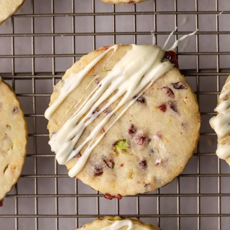 These Cranberry Shortbread Cookies with White Chocolate Frosting are super flavorful! Perfect for Christmas or anytime of the year! White Chocolate Chip Cranberry Shortbread Cookies, Frosted Cranberry Drop Cookies, Shortbread Sticks, Cranberry Pistachio Shortbread Cookies, Cranberry Orange Pound Cake, Best Shortbread Cookie Recipe, Cranberry Shortbread Cookies, Cranberry Shortbread, Cranberry Orange Shortbread Cookies