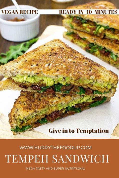 Tempeh Sandwich – Give in to Temptation - Vegan Recipe. This tempeh sandwich is THE new vegan sandwich. Mega tasty and super nutritional, it sets the new bar for all sandwich lovers out there. by hurrythefoodup.com #VeganRecipe #Vegan #HealthyEating #HealthyRecipe #VeganSandwich Tempeh Sandwich Vegan, Tempeh Sandwich Recipes, Tempeh Sandwich, Tempeh Burger, Vegan Burritos, Tasty Sandwiches, Tempeh Recipe, Vegan Sandwich Recipes, Vegan Sandwiches