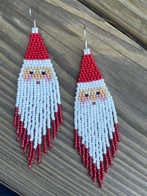 These Santa earrings are so cute! They are perfect for the holidays, and you'll be sure to get a compliment when wearing them!     Details: * Handmade * Toho Seed Beads * Nylon Thread * Nickel Free Ear Hook * Length - 3.93 in  * Width - 1.18 in Red Beaded Earrings For Christmas, Christmas Fringe Earrings, Christmas Seed Bead Earrings, Santa Fringe Earrings, Seed Bead Christmas, Santa Beaded Earrings, Santa Seed Bead Earrings, Christmas Beaded Earrings Toocutebeads.com, Christmas Beaded Earrings