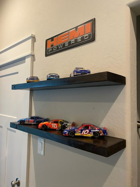 Shelf Decor Bedroom Men, Car Bedroom Ideas For Men, Car Lover Room Ideas, F1 Shelf, Jdm Car Room Decor, Car Guy Bedroom Aesthetic, Car Room Decor Men, Car Guy Room Ideas, Car Guy Room