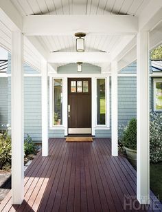 The aesthetically pleasing covered walkway between the house and the garage provides protection from the elements New England Home, Covered Walkway, Garage Remodel, Backyard Remodel, New England Homes, Patio Designs, Garage Plans, Home Magazine, The Garage